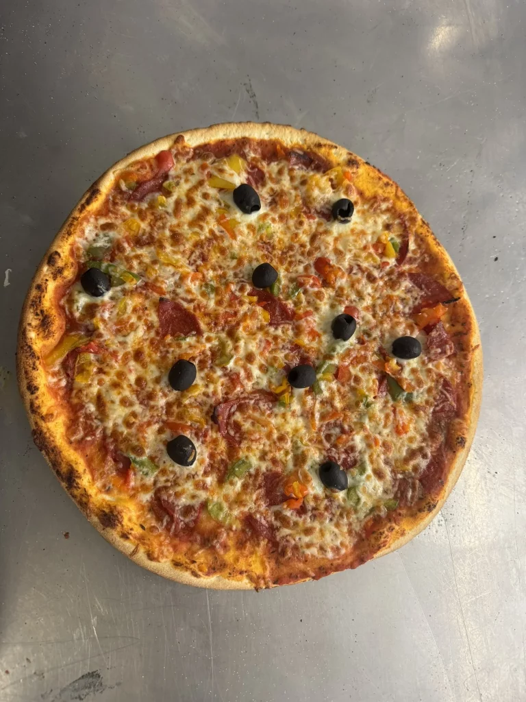 Pizza artisanale photographiée chez L’As De Pizz